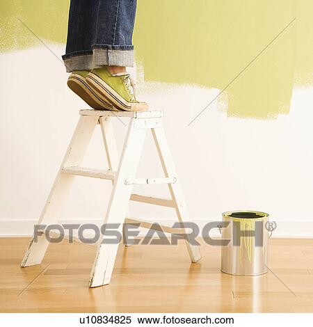 Legs of woman standing on tiptoe on stepladder with paint can and painted wall. View Large Photo Image Stock Photography - Legs of woman standing on tiptoe on stepladder with paint can and painted wall.. Fotosearch