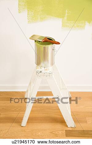 Paintbrush on can on top of step ladder with painted wall. View Large Photo Image Stock Image - Paintbrush on can on top of step ladder with painted wall.. Fotosearch