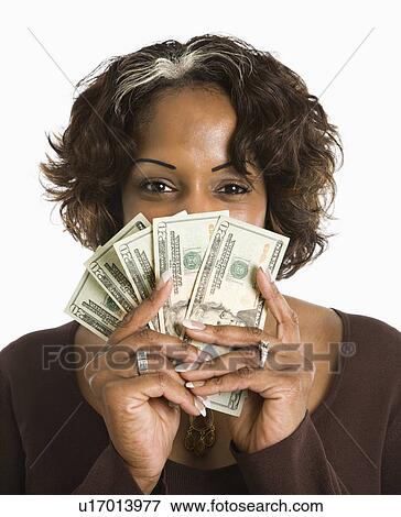 Portrait of woman holding twenty dollar bills in hand. View Large Photo Image Stock Photo - Portrait of woman holding twenty dollar bills in hand.. Fotosearch