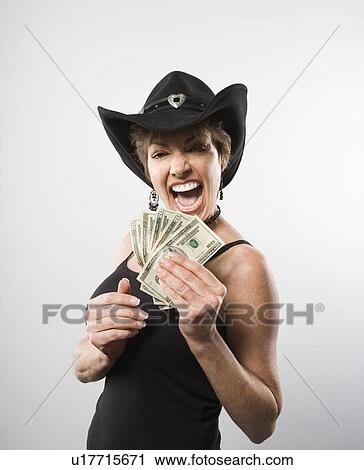 Woman holding twenty dollar bills View Large Photo Image Stock Image - Woman holding twenty dollar bills . Fotosearch