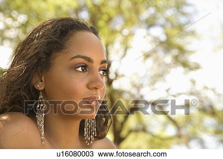 Stock Image - Woman outdoors. Fotosearch