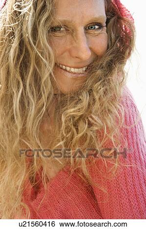 Stock Photograph - Woman with wavy hair . Fotosearch