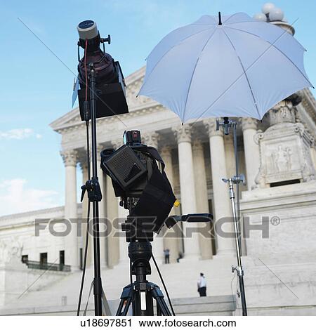 TV production set with camera and lighting equipment on tripods in front of Supreme Court building in Washington D. C. View Large Photo Image Stock Image - TV production set with camera and lighting equipment on tripods in front of Supreme Court building in Washington D. C.. Fotosearch