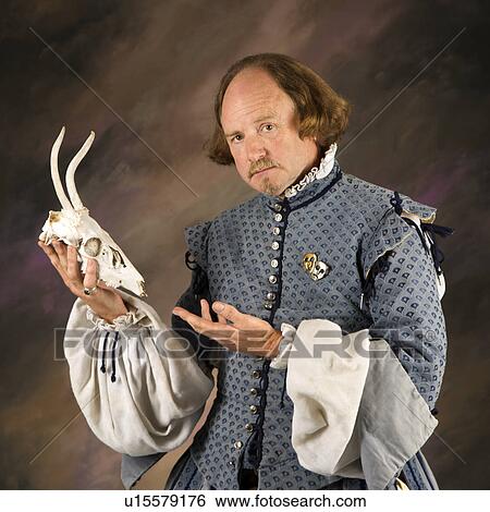 William Shakespeare in period clothing holding deer skull and looking at viewer View Large Photo Image Stock Photograph - William Shakespeare in period clothing holding deer skull and looking at viewer. Fotosearch