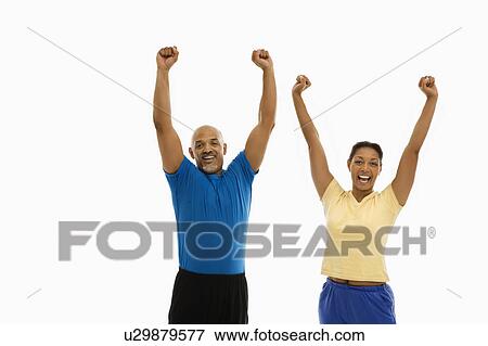 Stock Photo - Man and woman wearing exercise . Fotosearch