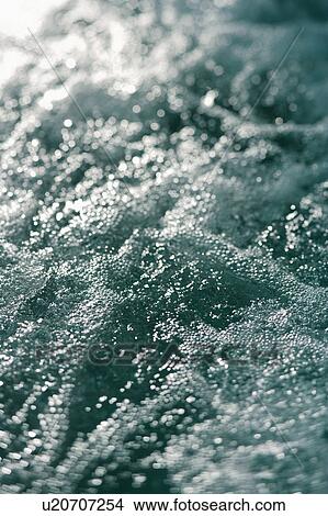 Churning water with air bubbles View Large Photo Image Picture - Churning water with air bubbles. Fotosearch