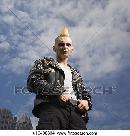 Picture - Male punk with skyline. Fotosearch