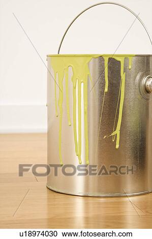 Paint can with drips sitting on wood floor View Large Photo Image Stock Image - Paint can with drips sitting on wood floor. Fotosearch