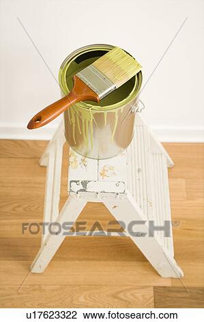 Paintbrush on can on top of step ladder View Large Photo Image Stock Image - Paintbrush on can on top of step ladder. Fotosearch