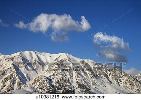 Aerial landscape of snow covered mountain peaks in California, USA. View Large Photo Image Stock Photography - Aerial landscape of snow covered mountain peaks in California, USA.. Fotosearch