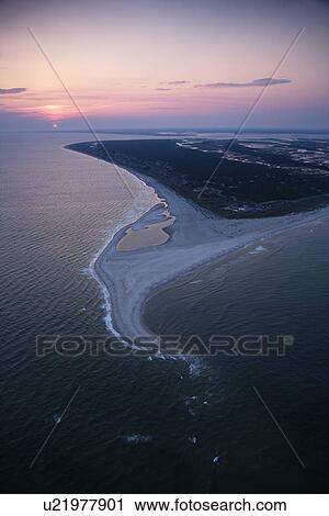 Stock Image - Aerial of east coast island beach of Bald Head Island, North Carolina.. Fotosearch