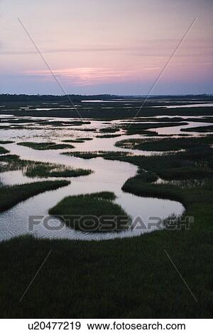 Aerial of wetland on Bald Head Island, North Carolina View Large Photo Image Stock Photo - Aerial of wetland on Bald Head Island, North Carolina. Fotosearch
