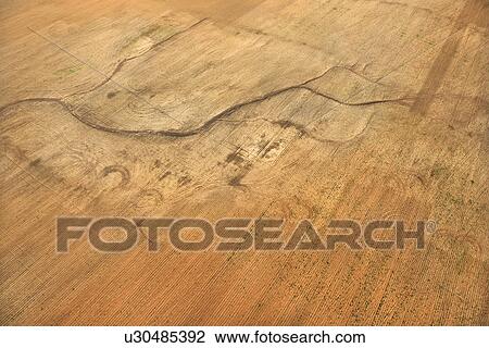 Aerial view of cultivated cropland. View Large Photo Image Stock Image - Aerial view of cultivated cropland.. Fotosearch