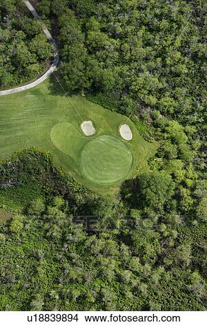 Picture - Aerial view of golf hole on golf course. Fotosearch