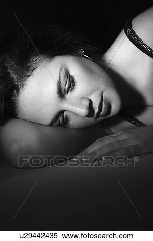 Sexy woman in bra lying down resting View Large Photo Image Stock Photography - Sexy woman in bra lying down resting. Fotosearch