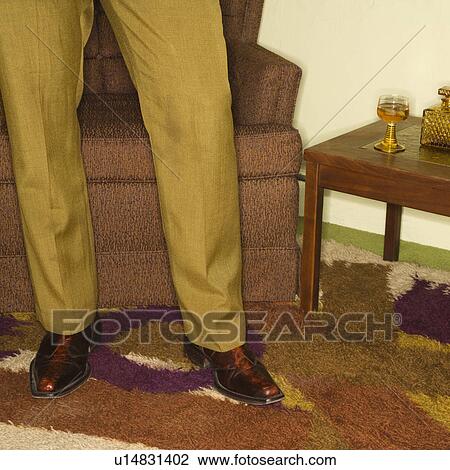 Close-up of standing Caucasian mid-adult male legs in vintage clothing. View Large Photo Image Stock Image - Close-up of standing Caucasian mid-adult male legs in vintage clothing.. Fotosearch