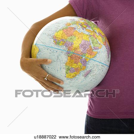 Arm and hips woman holding globe View Large Photo Image Stock Image - Arm and hips woman holding globe. Fotosearch