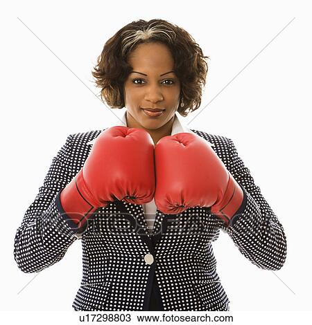 Businesswoman wearing boxing gloves. View Large Photo Image Stock Image - Businesswoman wearing boxing gloves.. Fotosearch