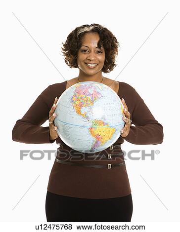 Smiling woman holding earth globe View Large Photo Image Stock Photo - Smiling woman holding earth globe. Fotosearch