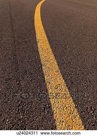 Close up of yellow line on asphalt. View Large Photo Image Stock Image - Close up of yellow line on asphalt.. Fotosearch