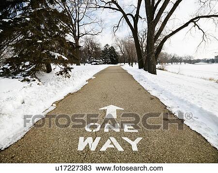 Paved path in park reading one way. View Large Photo Image Stock Image - Paved path in park reading one way.. Fotosearch