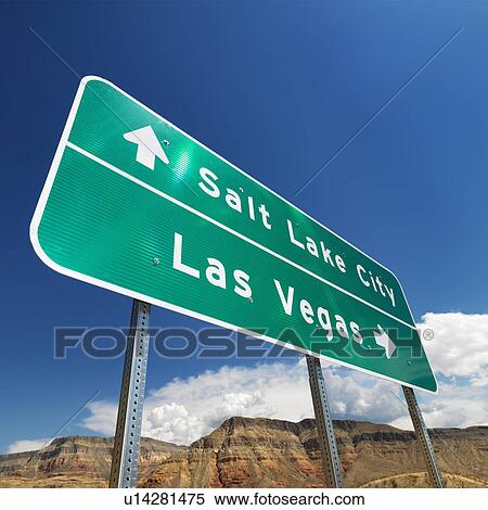 Stock Photography - Road sign in desert pointing towards Salt Lake City and Las Vegas. Fotosearch