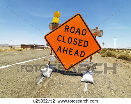 Road sign on rural highway warning that road is closed ahead. View Large Photo Image Stock Image - Road sign on rural highway warning that road is closed ahead.. Fotosearch