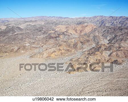 Aerial view of remote California desert and mountain range View Large Photo Image Stock Image - Aerial view of remote California desert and mountain range. Fotosearch