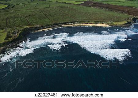 Aerial view of surf spot on coast of Maui, Hawaii with waves View Large Photo Image Stock Image - Aerial view of surf spot on coast of Maui, Hawaii with waves. Fotosearch