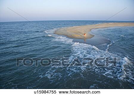 Stock Photography - Birds eye view of people on sandbar in Bald Head Island, North Carolina. Fotosearch