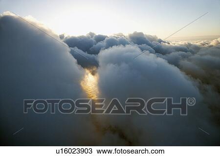 Clouds with Pacific ocean underneath View Large Photo Image Stock Image - Clouds with Pacific ocean underneath. Fotosearch