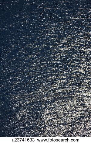Stock Image - High angle view of ocean water ripples. Fotosearch