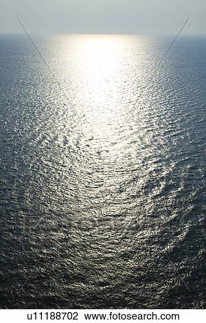 Sun reflecting off Atlantic ocean View Large Photo Image Stock Image - Sun reflecting off Atlantic ocean. Fotosearch