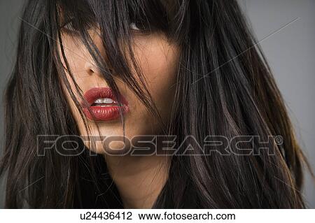 Headshot of pretty young woman with long black hair. View Large Photo Image Stock Image - Headshot of pretty young woman with long black hair.. Fotosearch