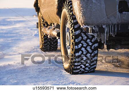 Close up of truck on ice covered road View Large Photo Image Stock Image - Close up of truck on ice covered road. Fotosearch