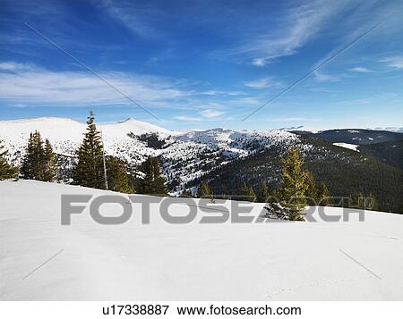 Snow covered mountain landscape. View Large Photo Image Stock Photo - Snow covered mountain landscape.. Fotosearch