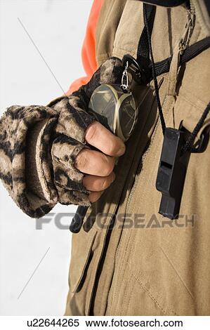 Hand holding walkie talkie View Large Photo Image Stock Photography - Hand holding walkie talkie. Fotosearch