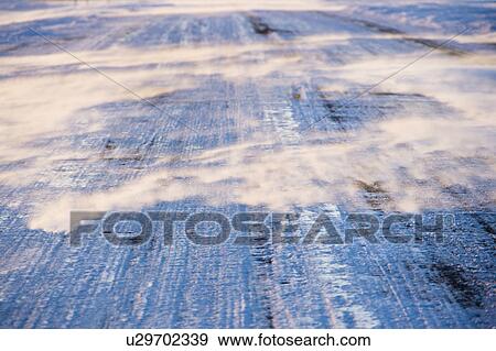 Ice covered road with tire marks View Large Photo Image Stock Photo - Ice covered road with tire marks. Fotosearch