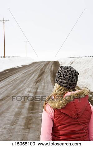 Looking down a muddy dirt road View Large Photo Image Stock Image - Looking down a muddy dirt road. Fotosearch