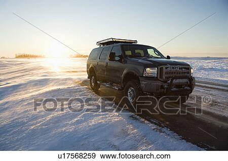 Truck on icy road View Large Photo Image Stock Photo - Truck on icy road . Fotosearch