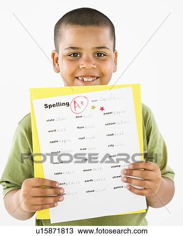Boy proudly showing paper with A+ View Large Photo Image Stock Image - Boy proudly showing paper with A+. Fotosearch