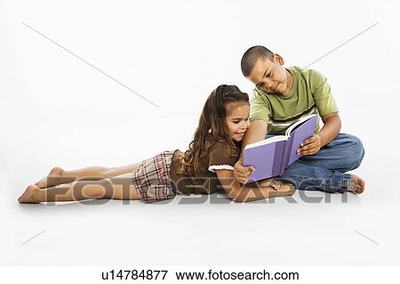 Brother and sister reading book together View Large Photo Image Stock Photo - Brother and sister reading book together. Fotosearch