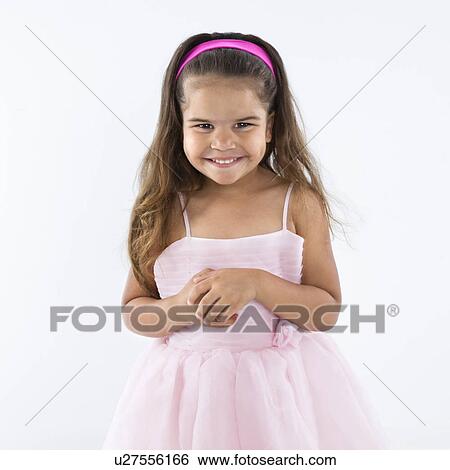 Cute little hispanic girl wearing pink dress smiling. View Large Photo Image Stock Photograph - Cute little hispanic girl wearing pink dress smiling.. Fotosearch