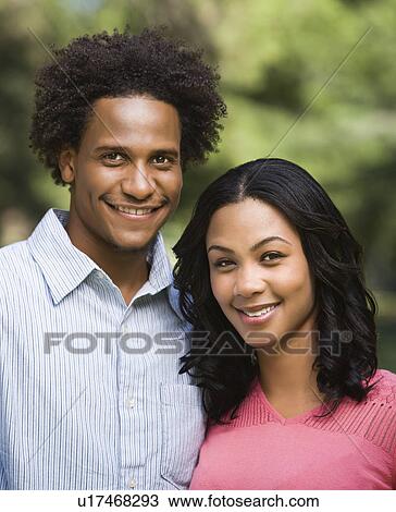 Couple in park View Large Photo Image Stock Image - Couple in park. Fotosearch