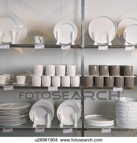 Retail display of porcelain dishes and mugs View Large Photo Image Picture - Retail display of porcelain dishes and mugs. Fotosearch