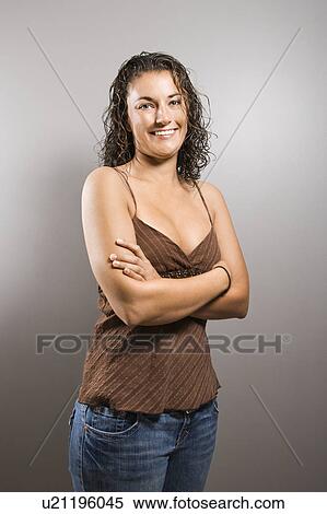 Female with arms crossed smiling View Large Photo Image Stock Photography - Female with arms crossed smiling . Fotosearch
