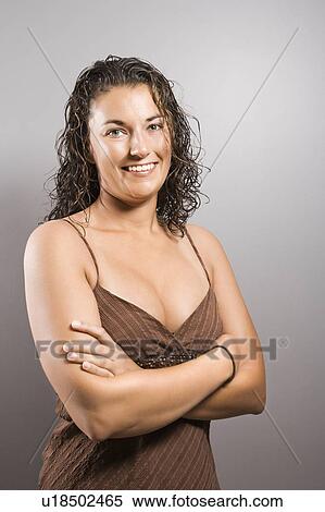Female with arms crossed View Large Photo Image Stock Photography - Female with arms crossed. Fotosearch