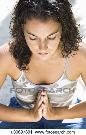 Woman practicing yoga View Large Photo Image Stock Image - Woman practicing yoga . Fotosearch