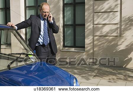 Man talking on mobile phone View Large Photo Image Stock Image - Man talking on mobile phone. Fotosearch