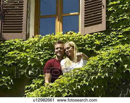Couple looking at view View Large Photo Image Stock Image - Couple looking at view. Fotosearch